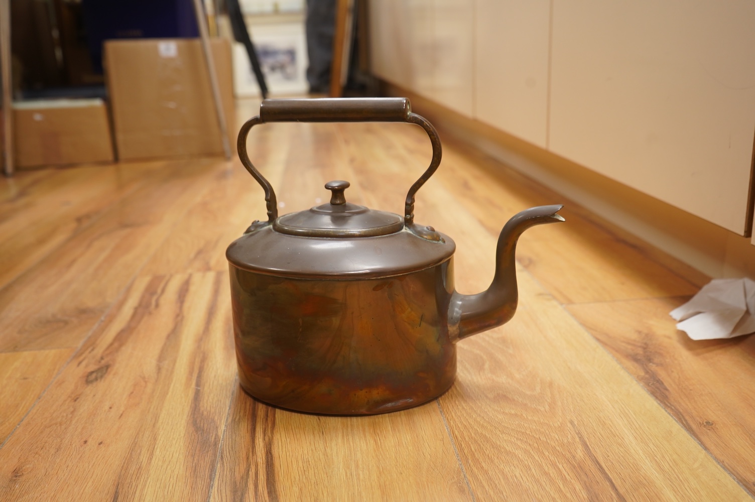 Two Benham & Froud copper saucepans and a copper kettle, largest 43cm in length